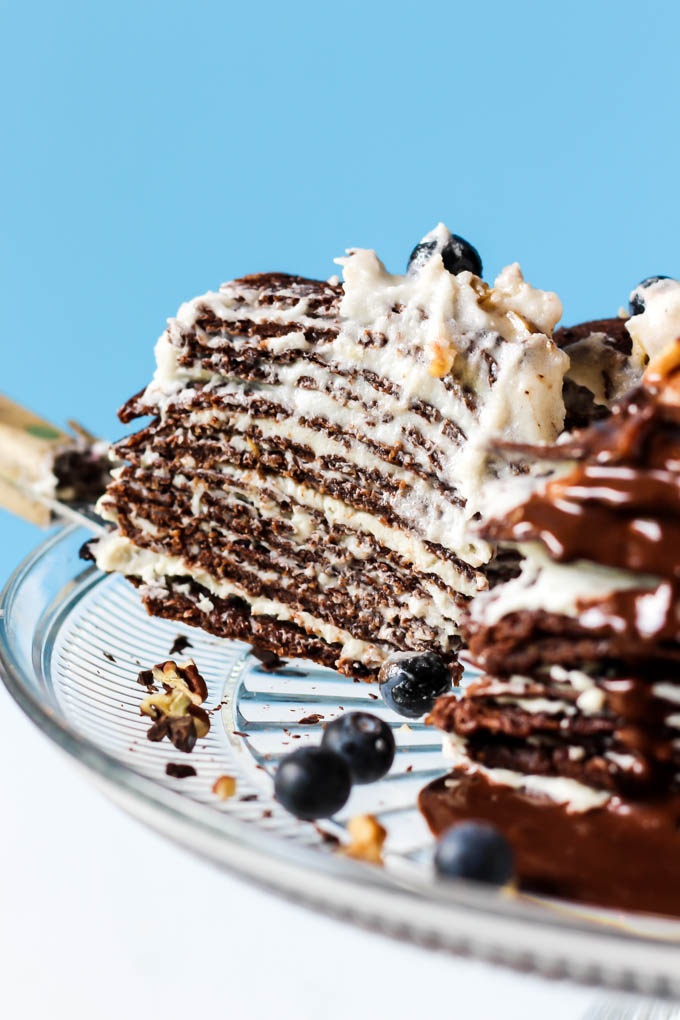 This Chocolate Crepe Cake is sure to stand out at any party! Made with wholesome ingredients, this vegan & gluten-free cake is a healthier way to indulge.