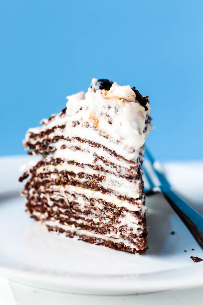 This Chocolate Crepe Cake is sure to stand out at any party! Made with wholesome ingredients, this vegan & gluten-free cake is a healthier way to indulge.