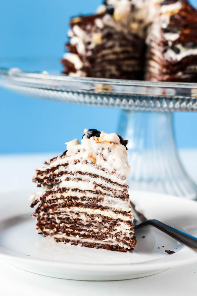 This Chocolate Crepe Cake is sure to stand out at any party! Made with wholesome ingredients, this vegan & gluten-free cake is a healthier way to indulge.