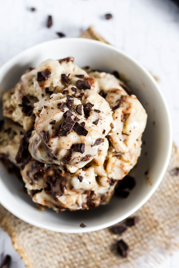 A bowl of vegan banana ice cream topped with chocolate chips