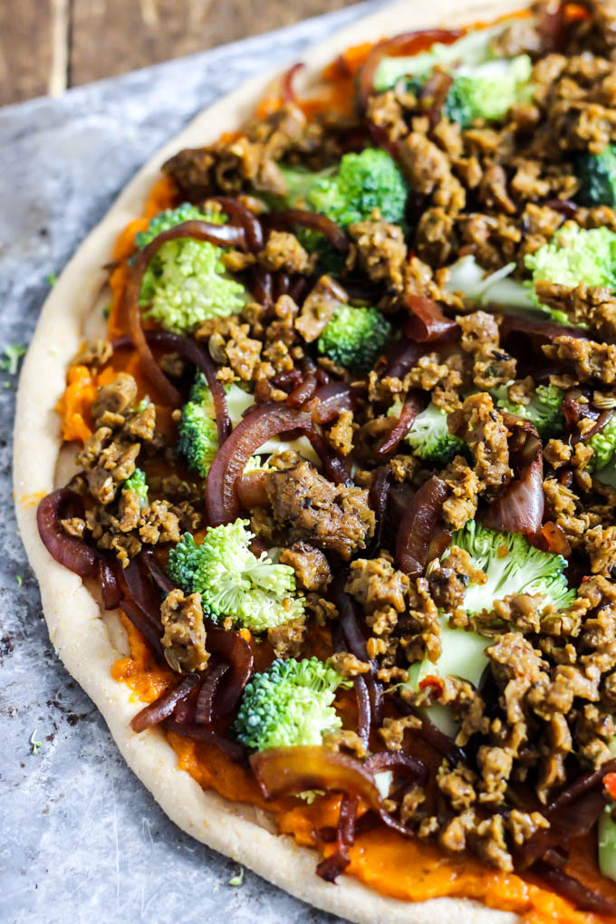 Put a twist on pizza night by making this Hearty Vegan Butternut Squash Pizza loaded with vegetables! It is full of plant protein, flavorful & whole wheat.