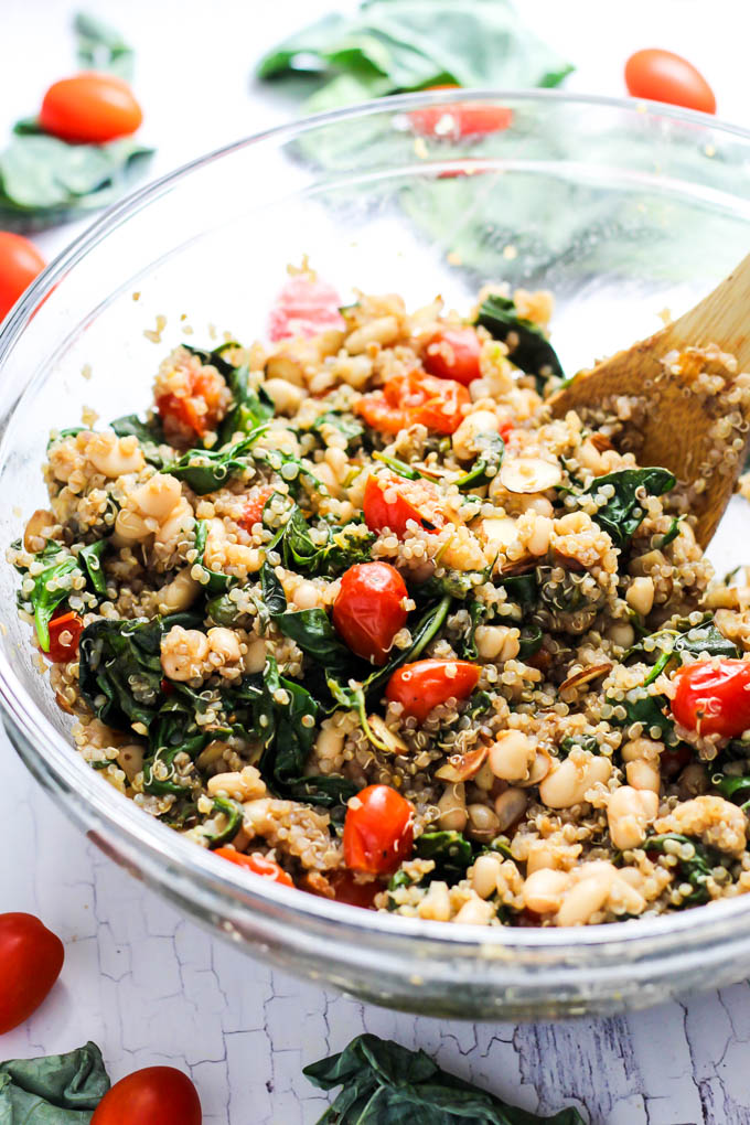 Complete your dinner with this Easy Quinoa Salad with Tomatoes & Spinach as a healthy side dish! It's vegan, gluten-free, and also makes a great lunch.