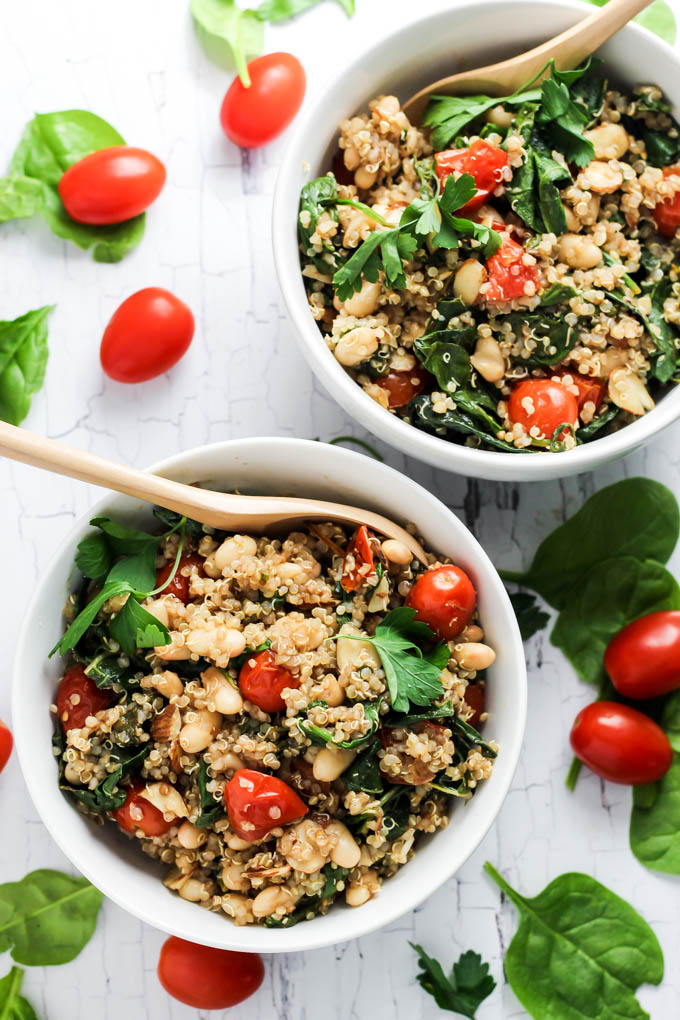 Complete your dinner with this Easy Quinoa Salad with Tomatoes & Spinach as a healthy side dish! It's vegan, gluten-free, and also makes a great lunch.