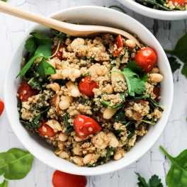 Complete your dinner with this Easy Quinoa Salad with Tomatoes & Spinach as a healthy side dish! It's vegan, gluten-free, and also makes a great lunch.