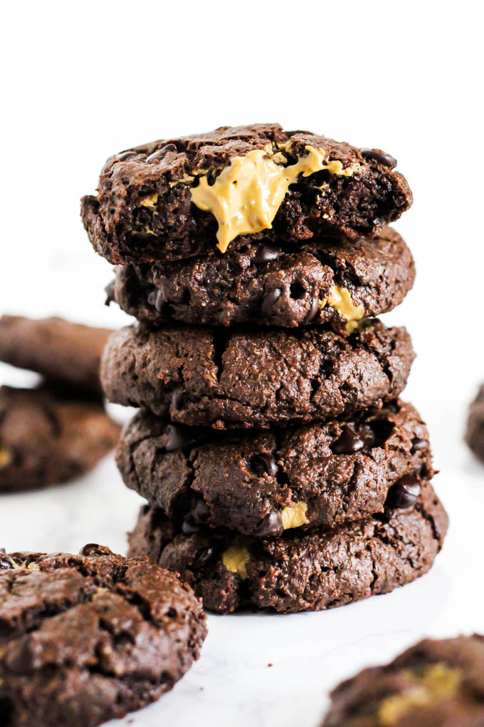 These gooey Stuffed Double Chocolate Chip Cookies are perfect treats to serve for a crowd! They're nut-free, vegan & gluten-free, so everyone can enjoy one.