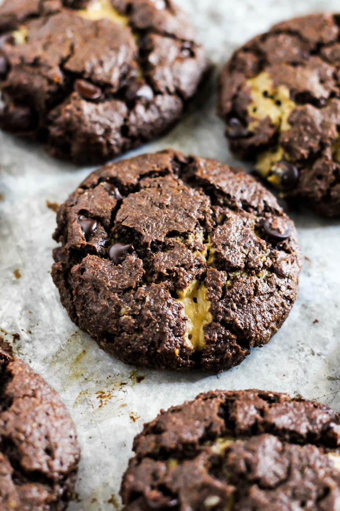 These gooey Stuffed Double Chocolate Chip Cookies are perfect treats to serve for a crowd! They're nut-free, vegan & gluten-free, so everyone can enjoy one.