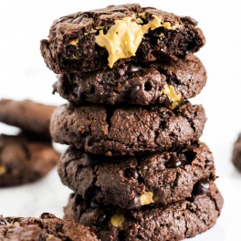 These gooey Stuffed Double Chocolate Chip Cookies are perfect treats to serve for a crowd! They're nut-free, vegan & gluten-free, so everyone can enjoy one.