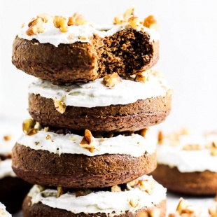 a stack of four gingerbread donuts