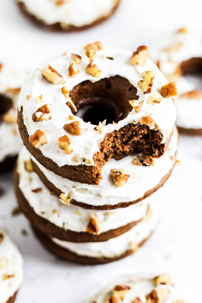 a stack of vegan gingerbread donuts
