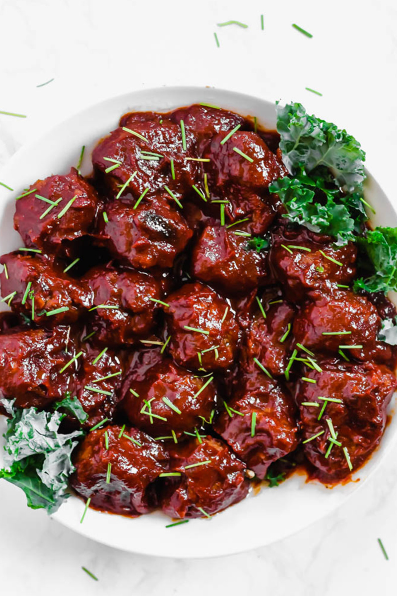 a plate of barbecue vegan meatballs