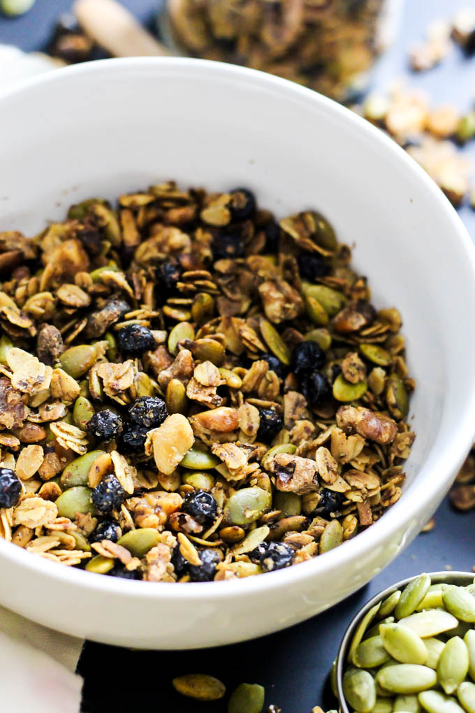 Crunchy & sweet, this Maple Walnut Granola is great with a splash of almond milk for breakfast - or sprinkle on top of smoothie bowls! Vegan & gluten-free.