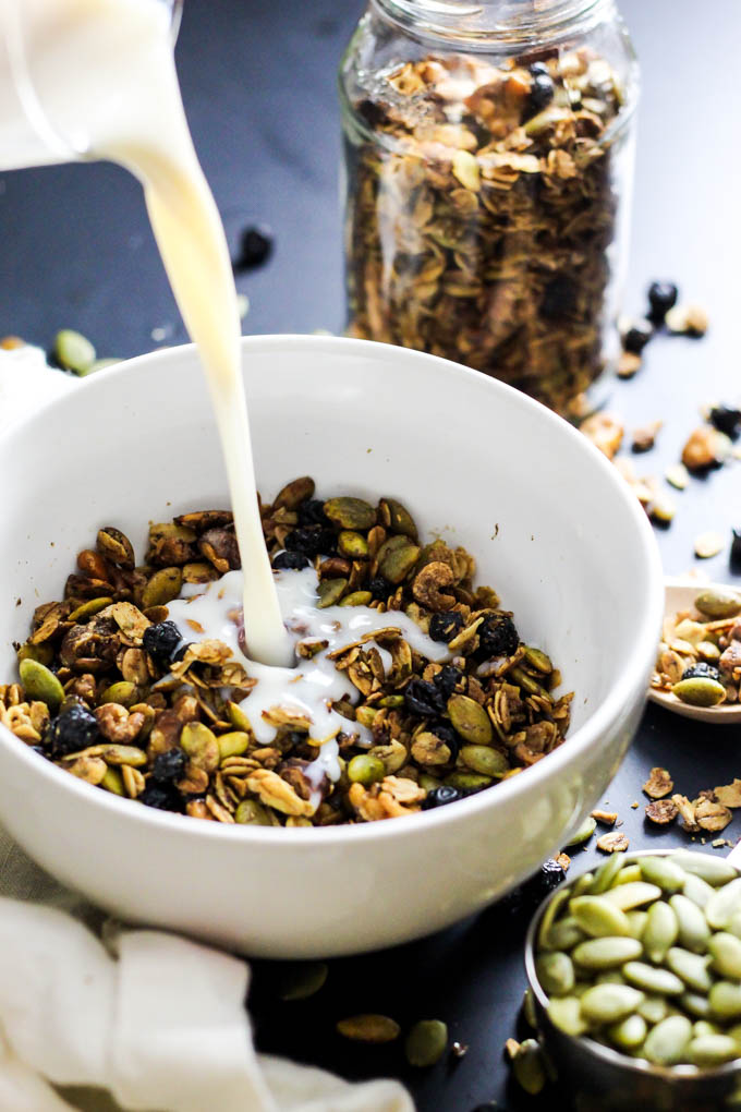 Crunchy & sweet, this Maple Walnut Granola is great with a splash of almond milk for breakfast - or sprinkle on top of smoothie bowls! Vegan & gluten-free.