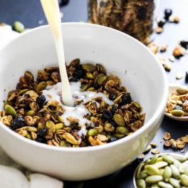 Crunchy & sweet, this Maple Walnut Granola is great with a splash of almond milk for breakfast - or sprinkle on top of smoothie bowls! Vegan & gluten-free.