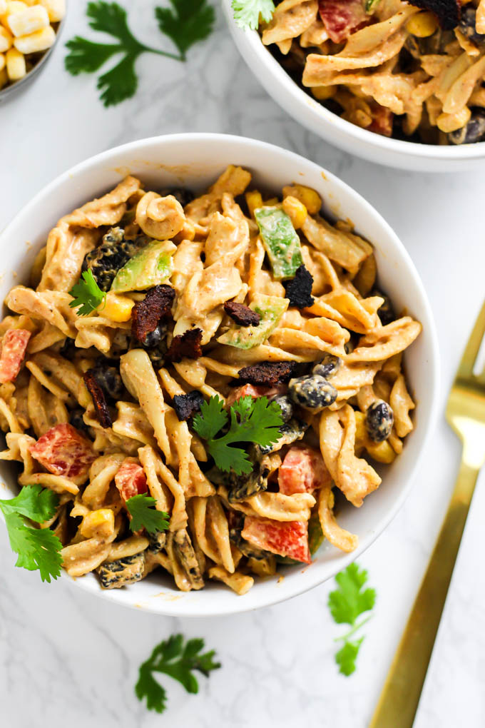 a bowl of Mexican-inspired pasta salad with a cashew cream sauce