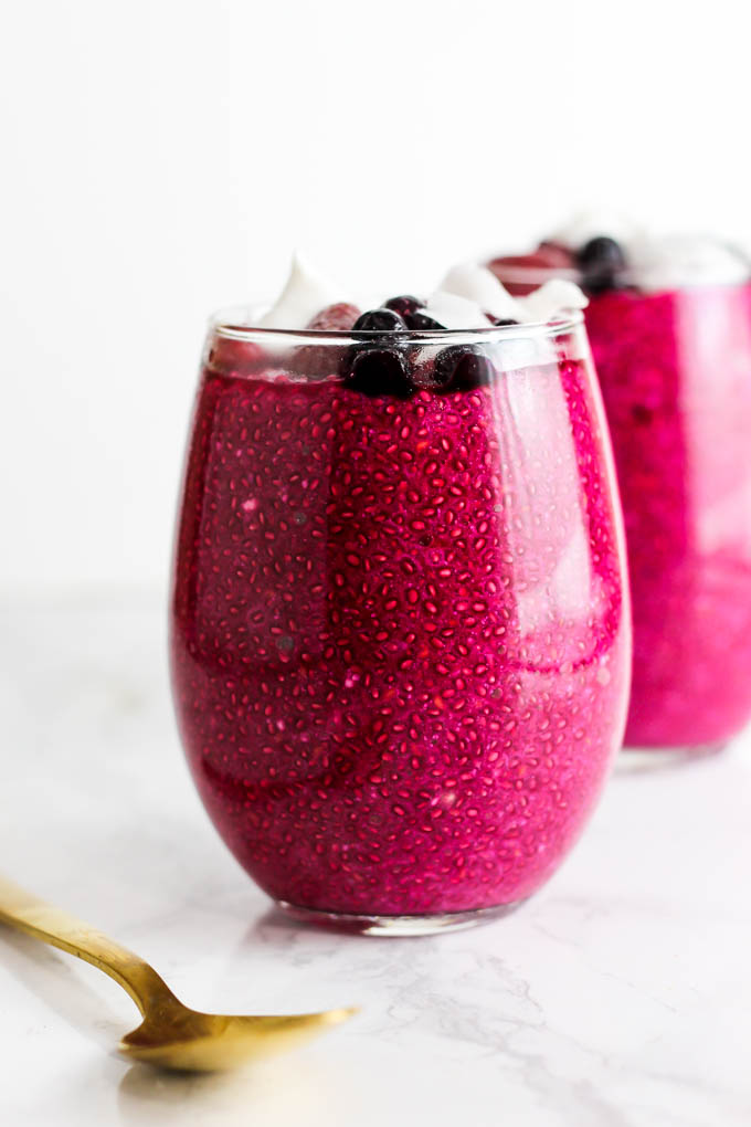 a cup of strawberry beet chia pudding