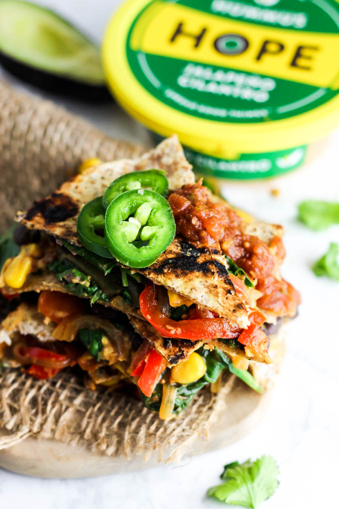 Enjoy this Vegan Quesadilla with Hummus & Vegetables for a healthy, flavorful meal or appetizer that is irresistible! Don't forget the guac. (gluten-free)