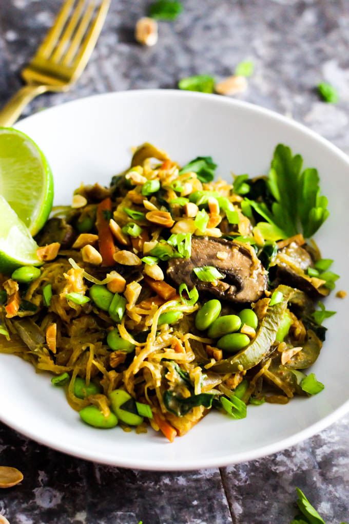 This Spaghetti Squash Peanut Stir Fry is an easy, hearty, vegetable-packed dinner that's done in just 1 hour. Vegan & gluten-free!