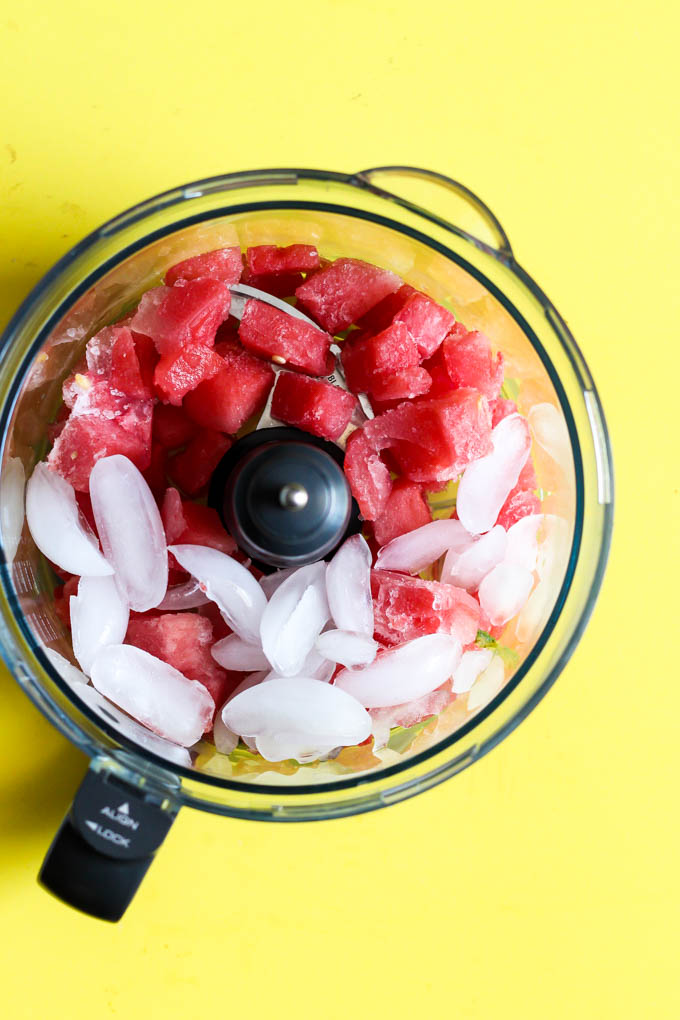 This Frozen Watermelon Margarita is your new go-to summertime drink! It's fruity, refreshing & made with only five ingredients. Perfect with chips & salsa!