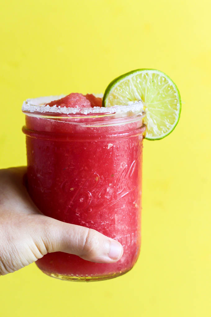 This Frozen Watermelon Margarita is your new go-to summertime drink! It's fruity, refreshing & made with only five ingredients. Perfect with chips & salsa!