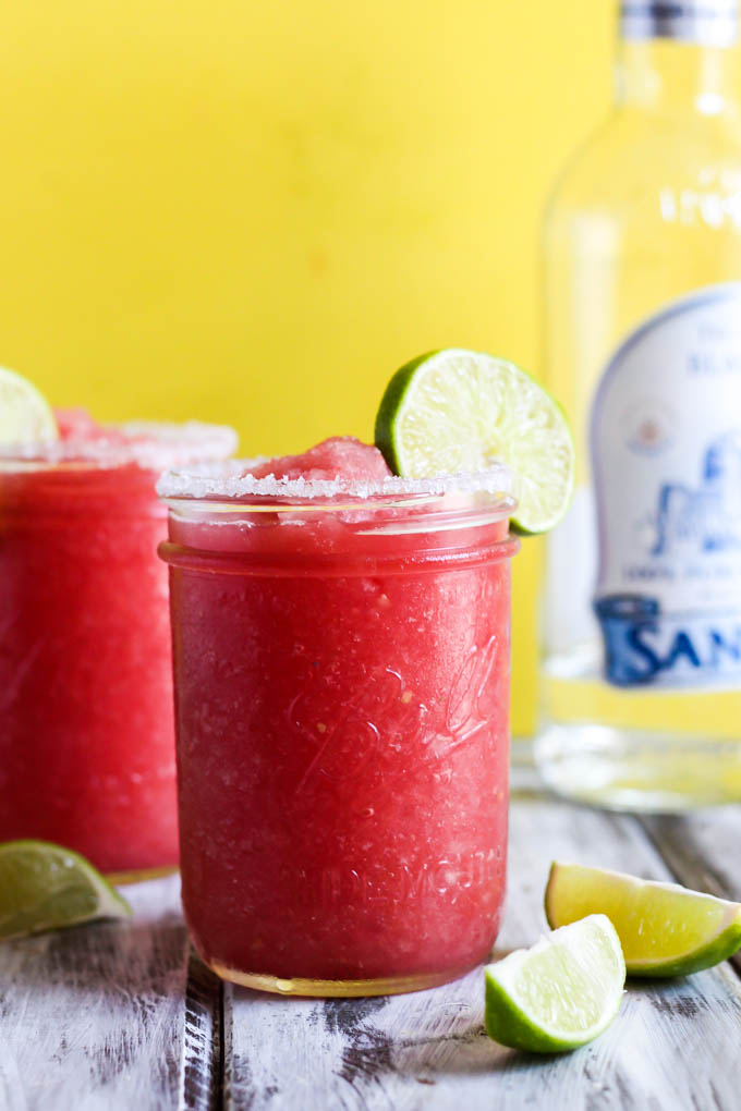 This Frozen Watermelon Margarita is your new go-to summertime drink! It's fruity, refreshing & made with only five ingredients. Perfect with chips & salsa!