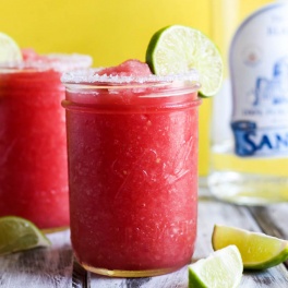 This Frozen Watermelon Margarita is your new go-to summertime drink! It's fruity, refreshing & made with only five ingredients. Perfect with chips & salsa!