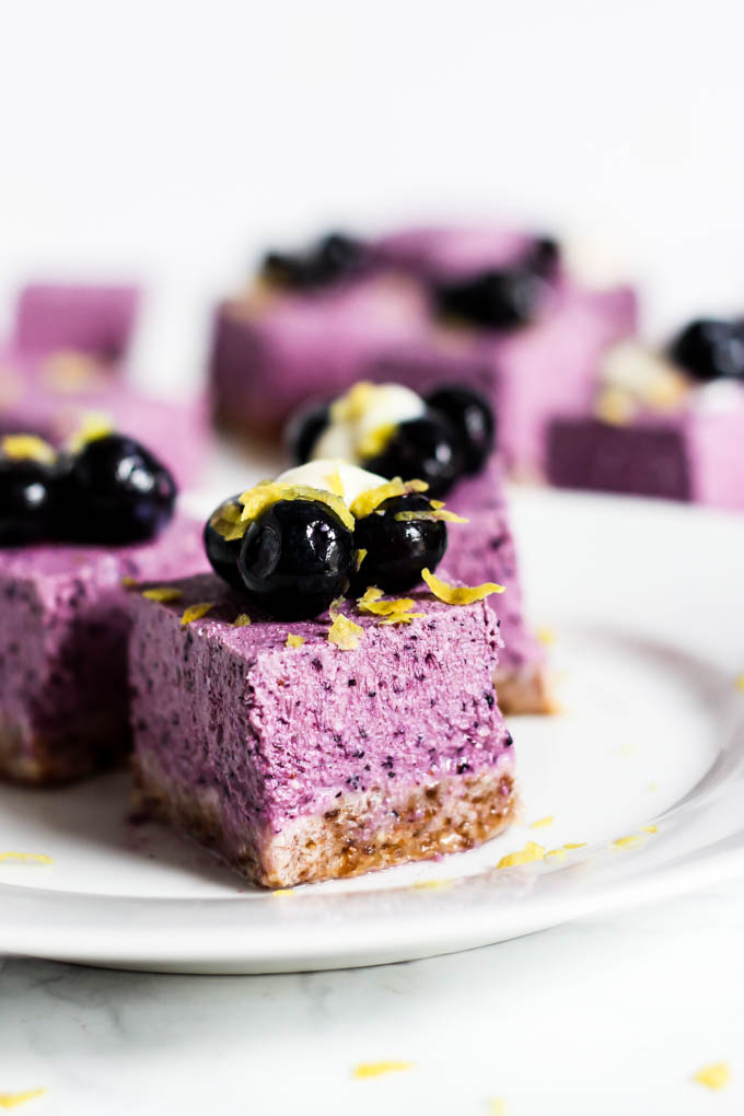 A perfect summer dessert, these No Bake Lemon Blueberry Cheesecake Bars are refreshing & full of fruity flavor! They're vegan, gluten-free & easy to make.