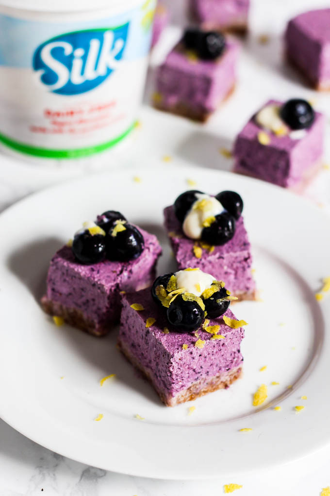 A perfect summer dessert, these No Bake Lemon Blueberry Cheesecake Bars are refreshing & full of fruity flavor! They're vegan, gluten-free & easy to make.