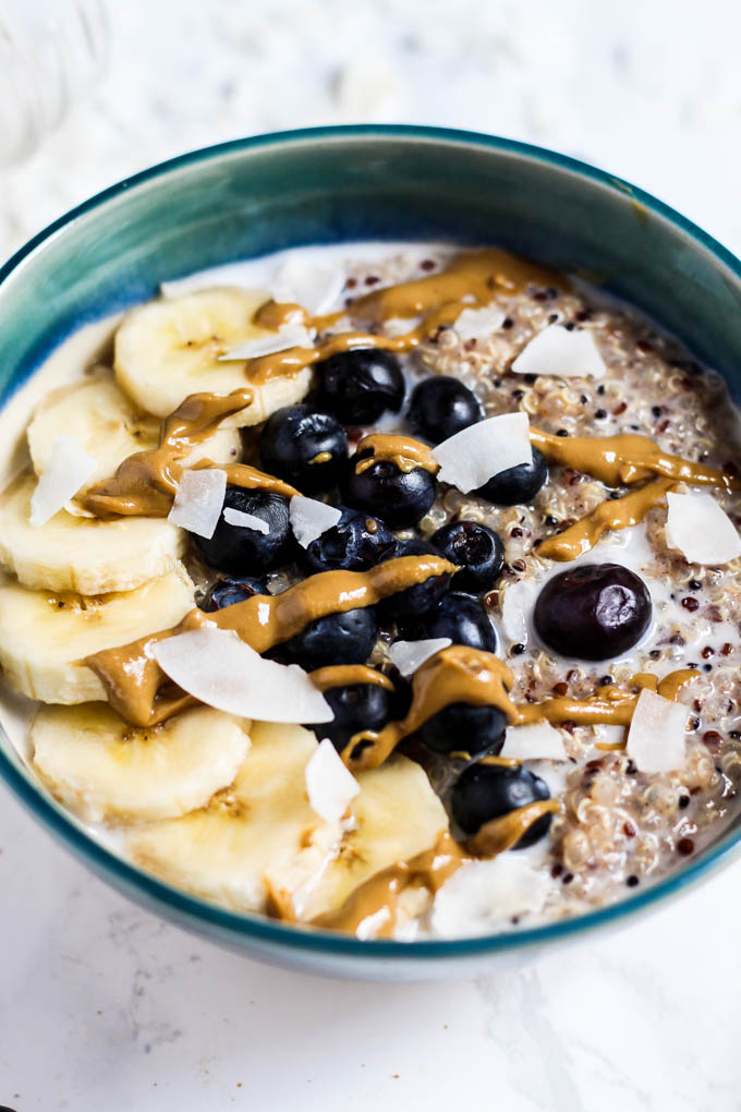 Want to change up your morning bowl of oats! Make this Breakfast Quinoa Bowl instead! It's creamy, satisfying, and perfect with any toppings you want. Vegan!