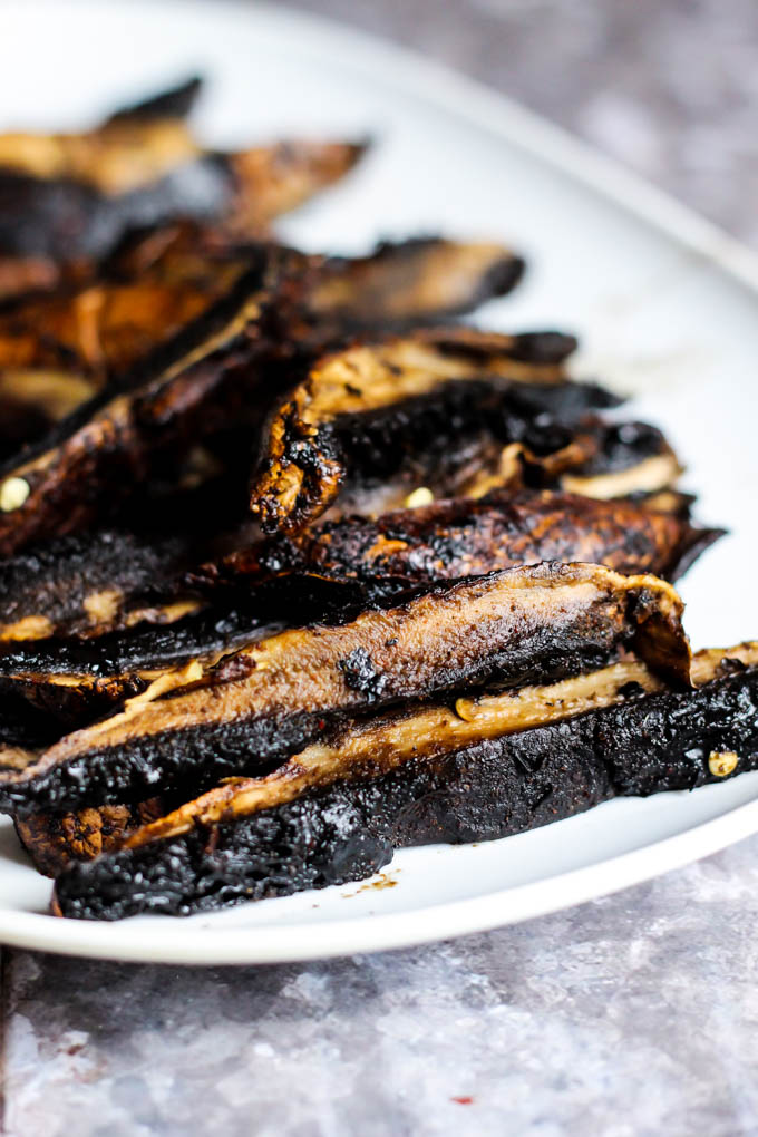 a plate of grilled portobello mushrooms