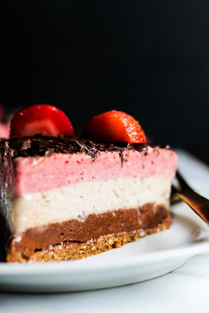 Why have just one ice cream flavor when you can have all three? This Neapolitan Banana Ice Cream cake is a creamy, decadent dessert for any occasion! Vegan & gluten-free.