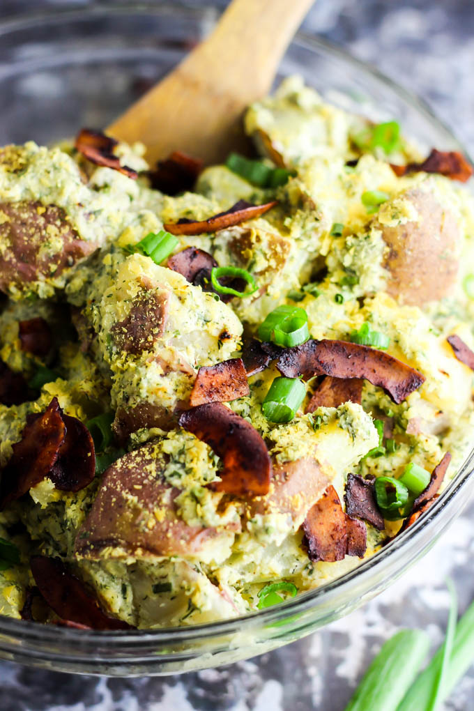a large mixing bowl filled with vegan bacon ranch potato salad