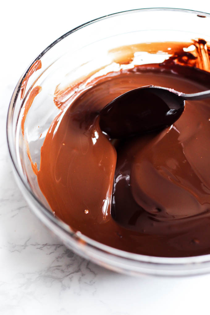 a bowl of melted dark chocolate
