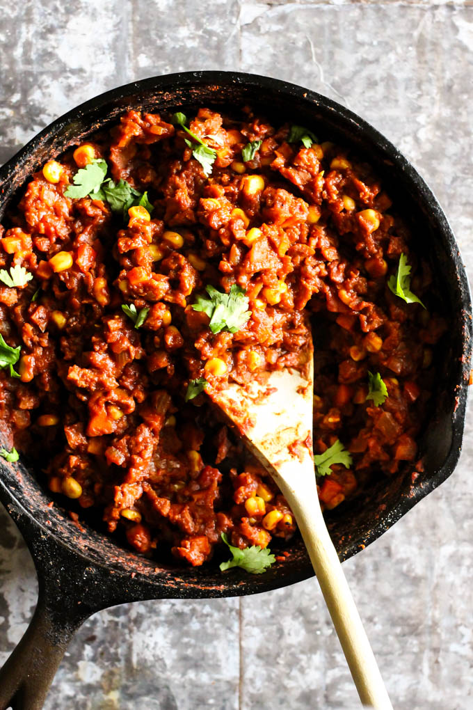 a cast iron skillet filled with a vegan sloppy joe mix