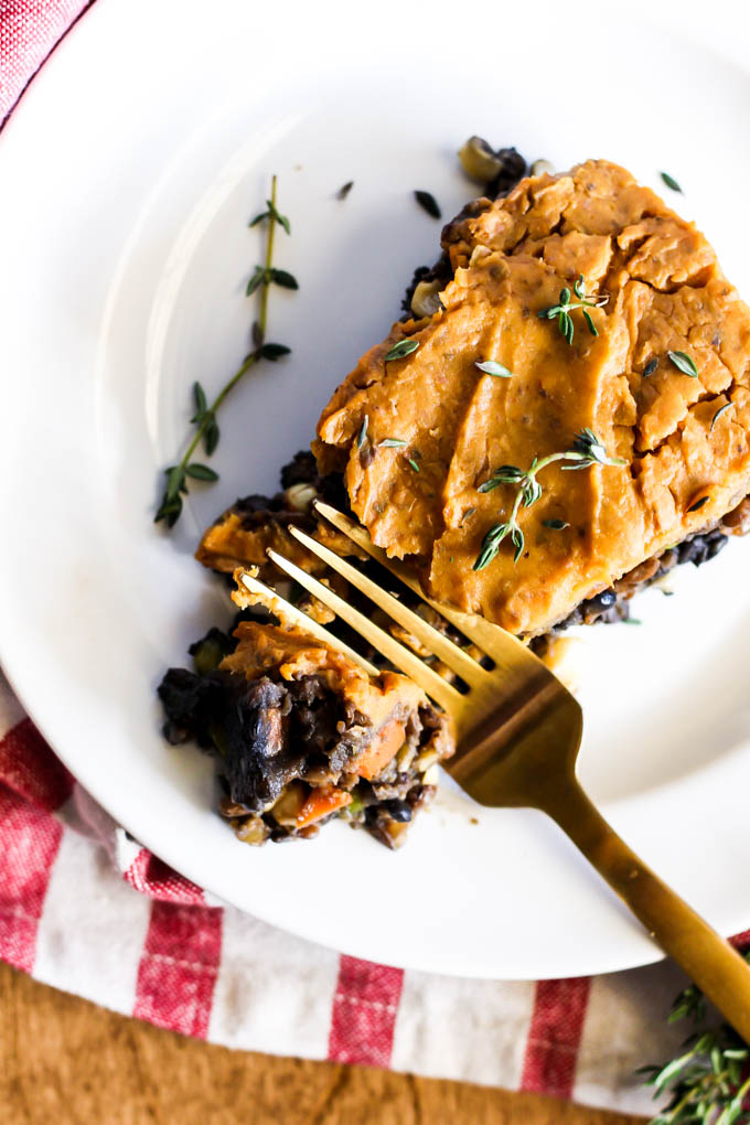 a fork slicing into some vegan shepherd's pie