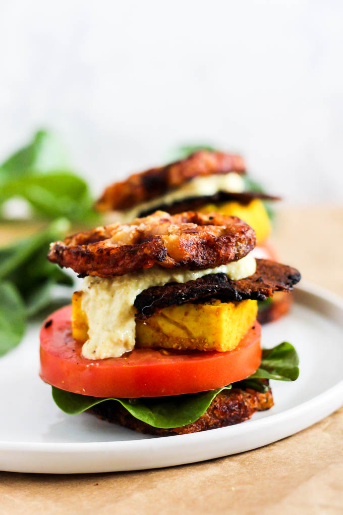 This Vegan Waffle Breakfast Sandwich is the ultimate brunch recipe to please everyone! It's loaded with hash browns, vegan bacon & dairy-free cheese. (gluten-free)