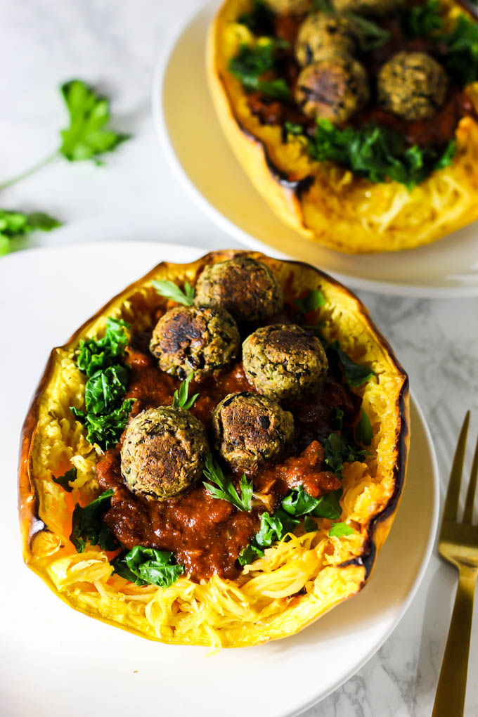 This Mushroom Spaghetti Squash recipe is a delicious, wholesome way to use seasonal squash! It's topped with a hearty mushroom sauce & vegan meatballs. (vegan & gluten-free)