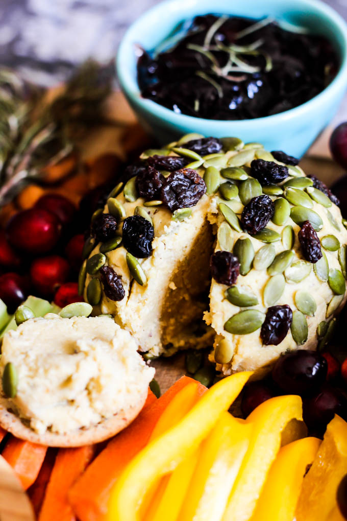 Serve this epic Vegan Charcuterie Board at your next party as a fun appetizer! Loaded with veggie meats, dairy-free cheese, fruit and vegetables.