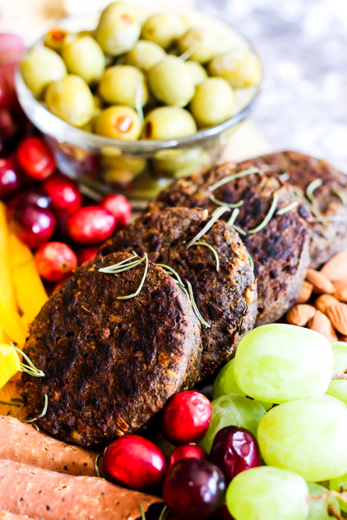 Serve this epic Vegan Charcuterie Board at your next party as a fun appetizer! Loaded with veggie meats, dairy-free cheese, fruit and vegetables.