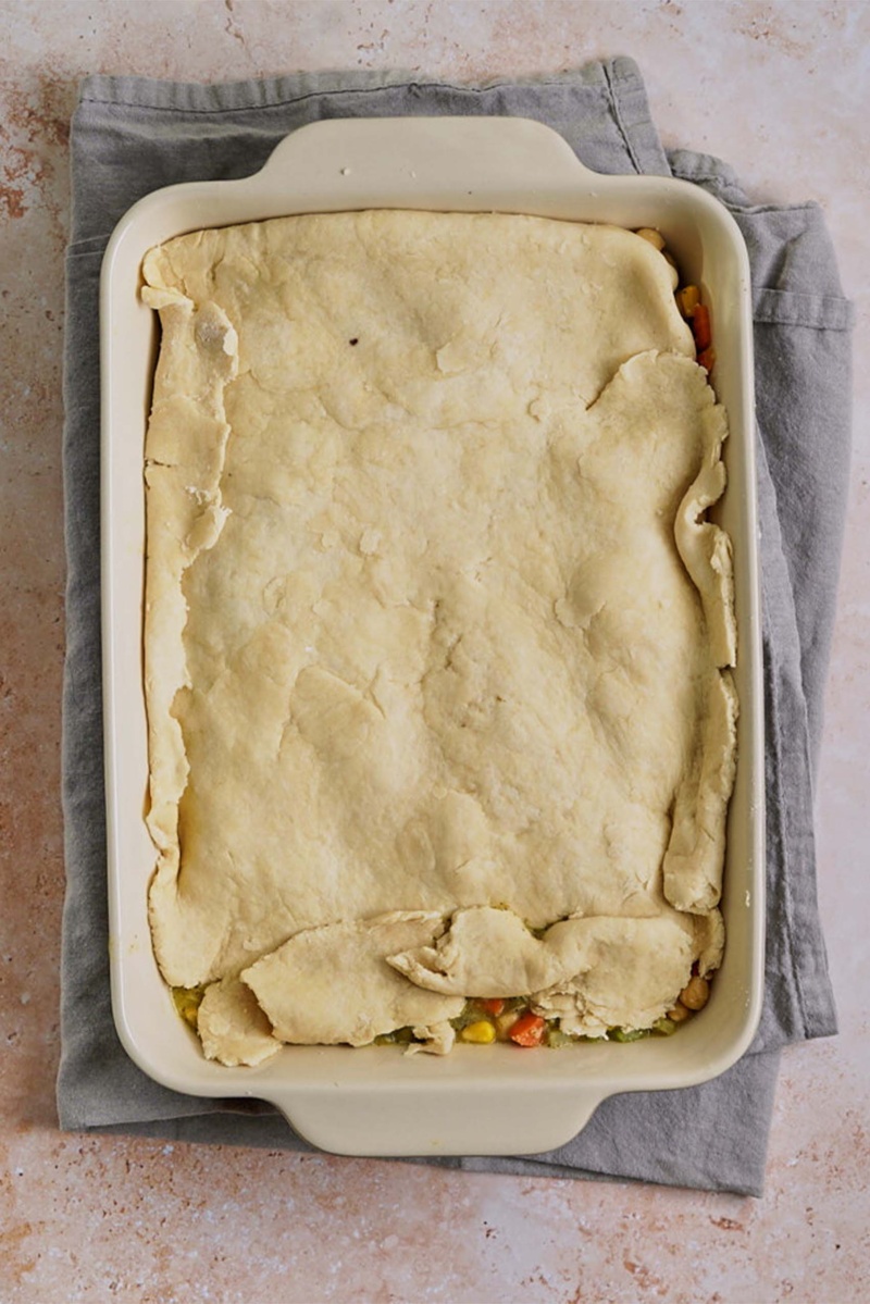 biscuit dough layered on top of a vegan pot pie filling