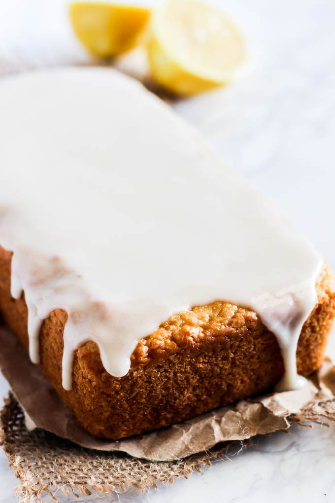 This Glazed Vegan Lemon Cake is fluffy & sweet with the perfect amount of tartness! It's an easy dessert to make for any party or holiday. Ready in 1 hour!