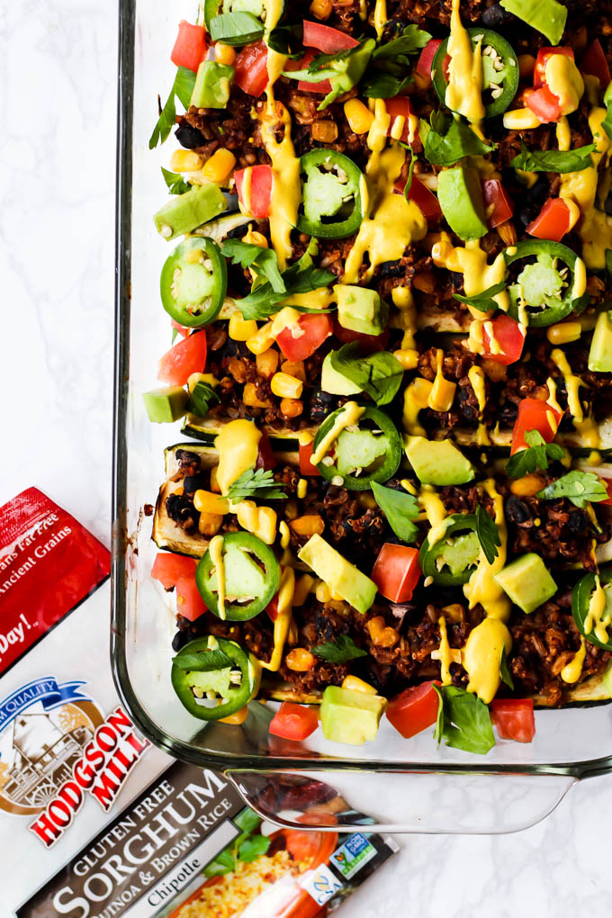 These easy Mexican Stuffed Zucchini make a balanced dinner with whole grains, vegetables & plant protein! Top with avocado & cashew cheese for more flavor.