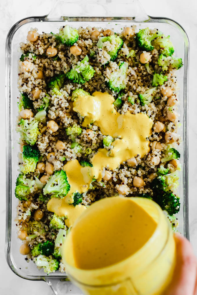 Make this wholesome Cheesy Chickpea, Quinoa & Broccoli Casserole and enjoy leftovers for days! Each serving is full of plant protein, whole grains & vegetables. Vegan & gluten-free!