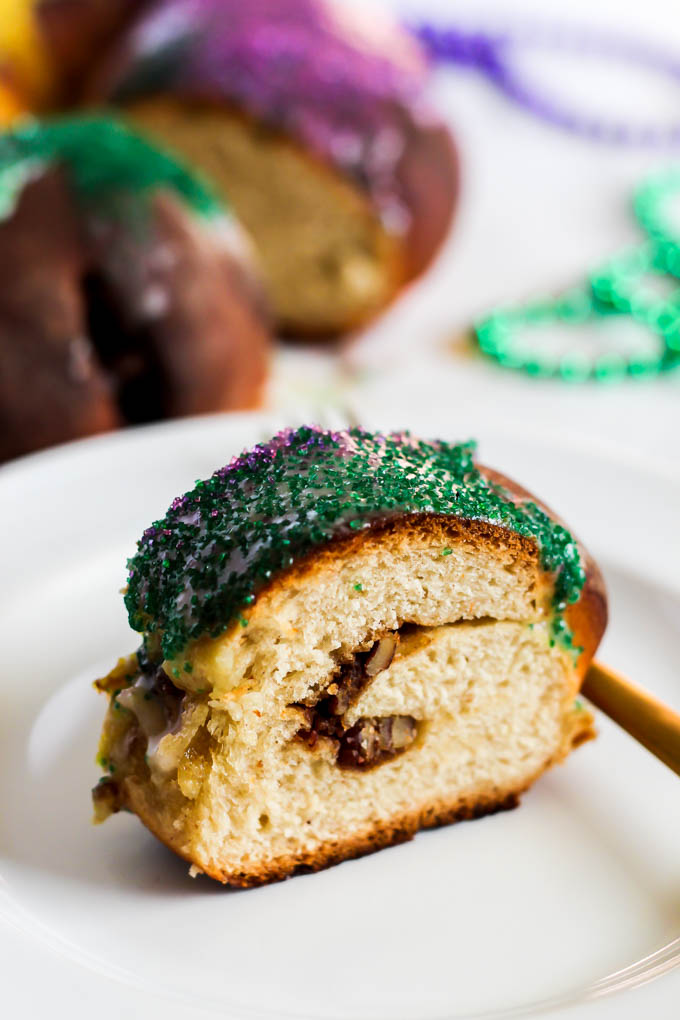 a slice of king cake on a plate