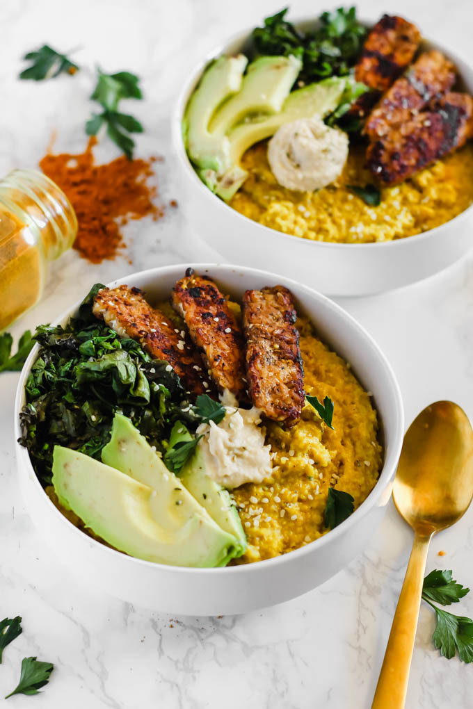 Enjoy these Savory Turmeric Oat Bowls for breakfast, lunch, or dinner as a hearty, nourishing meal! The turmeric adds an anti-inflammatory boost, and the tempeh bacon will satisfy your tastebuds.