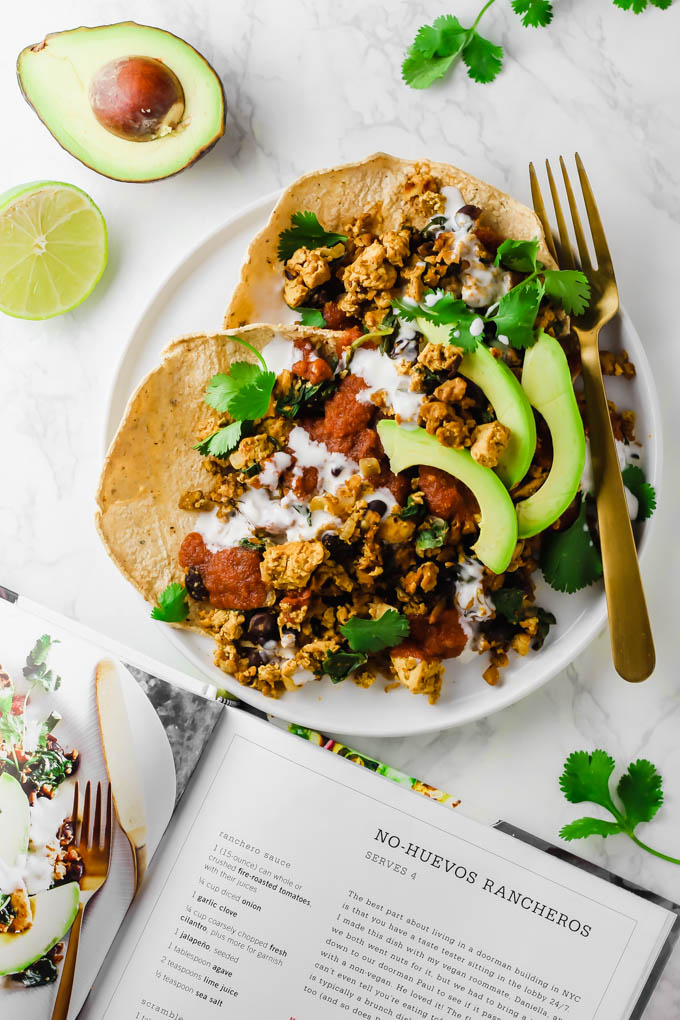 This protein-packed Vegan No-Huevos Rancheros dish is the perfect savory meal to serve for brunch, lunch, or dinner! Top with zesty ranchero sauce and tangy dairy-free sour cream for the ultimate plate.