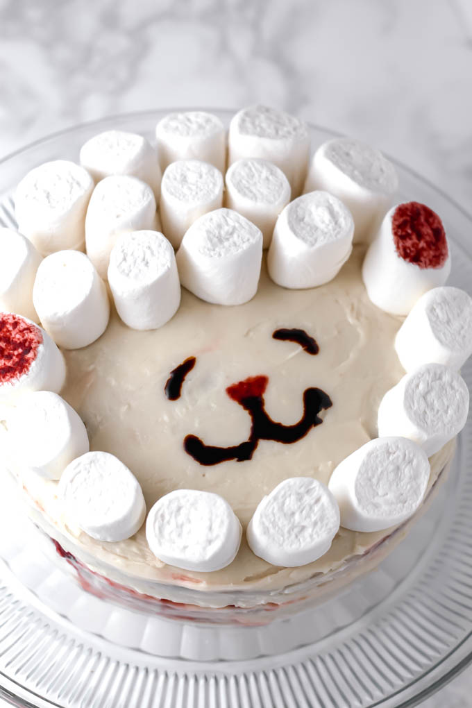 This fluffy, decadent Vegan Vanilla Strawberry Cake is perfect for any occasion—Easter, baby showers, birthday parties, you name it! To make it extra special for Easter, the cake is decorated with a marshmallow lamb.