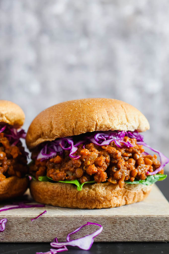 a vegan bbq sloppy joe topped with cabbage and lettuce