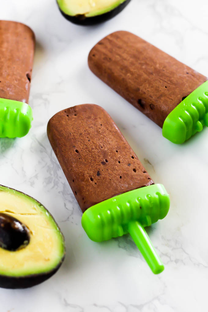 No one will guess the secret ingredient in these creamy Avocado Chocolate Fudge Pops! Full of healthy fats, these popsicles are the perfect sweet treat for the summer. (vegan & gluten-free)