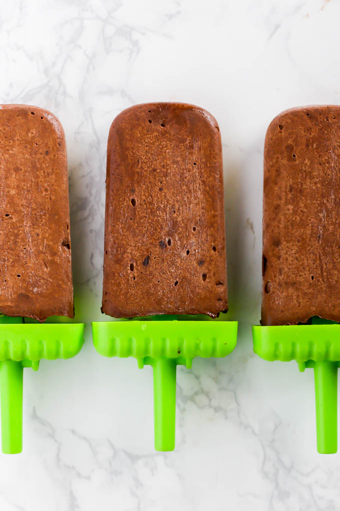 No one will guess the secret ingredient in these creamy Avocado Chocolate Fudge Pops! Full of healthy fats, these popsicles are the perfect sweet treat for the summer. (vegan & gluten-free)