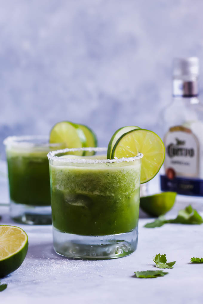 These Cilantro Cucumber Margaritas are a cool, refreshing twist on this classic cocktail! The cucumber is blended in for ultimate flavor. These pair perfectly with chips & salsa!